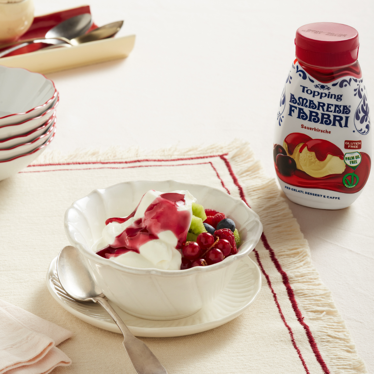 Yoghurt cup with fresh fruit and Amarena Fabbri Topping