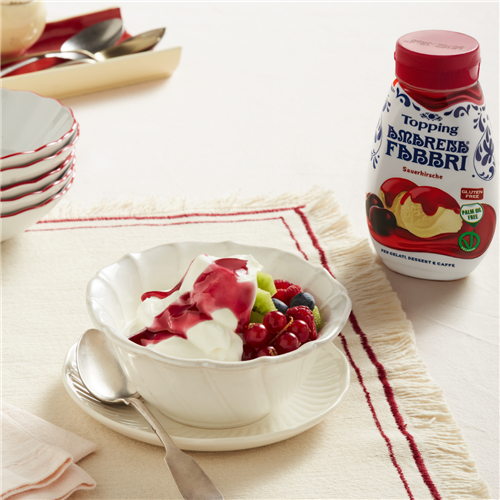 Yoghurt cup with fresh fruit and Amarena Fabbri Topping